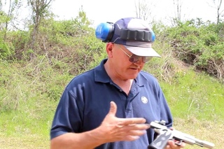27 rounds in 3.7 seconds with a 1911 pistol with World Record shooter, Jerry Miculek