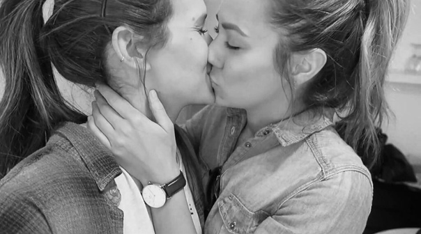 Model kissing girlfriend solo